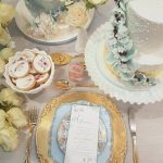 Vintage dinnerware, gold cutlery, chargers and milk glass pedestal stand, styling and cakes from The Garnished Co.